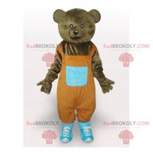 Mascote urso pardo com macacão laranja - Redbrokoly.com