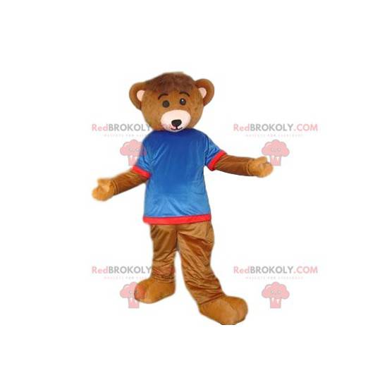 Braunbärenmaskottchen mit blauem und rotem Trikot -