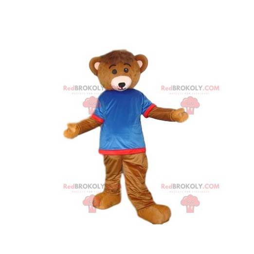Bruine beer mascotte met een blauwe en rode trui -