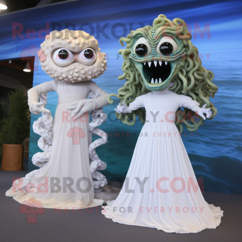 White Medusa mascot costume character dressed with a Wedding Dress and Cufflinks White Medusa mascot costume character dressed with a Wedding Dress and Cufflinks