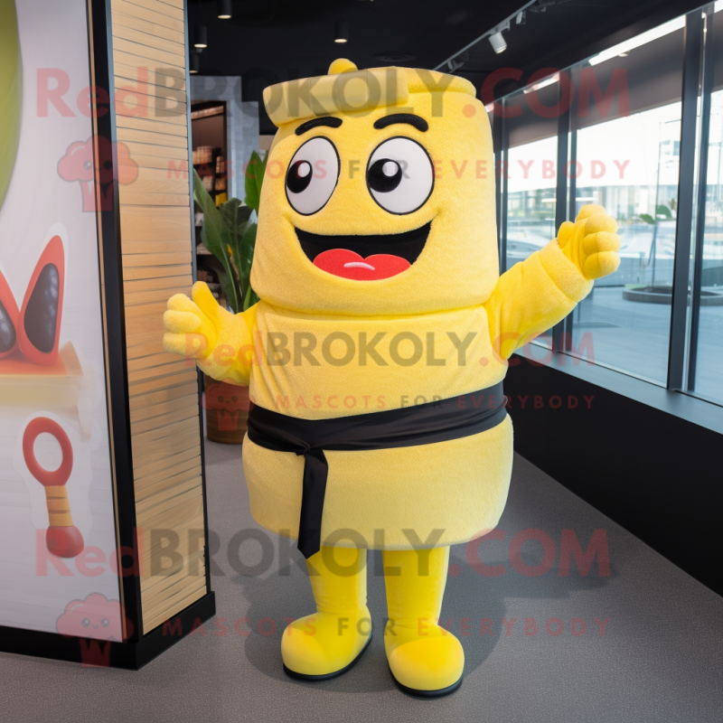 Yellow Sushi mascot costume character dressed with a Cardigan and Suspenders Yellow Sushi mascot costume character dressed with a Cardigan and Suspenders