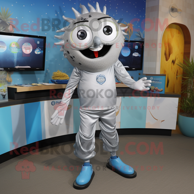 Gray Gyro mascot costume character dressed with a Capri Pants and Brooches