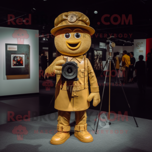 Gold Camera mascot costume character dressed with a Overalls and Hat pins