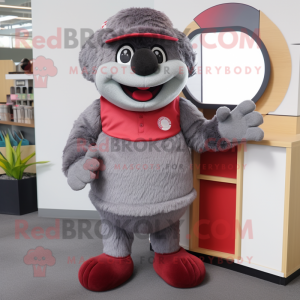 Gray Raspberry mascot costume character dressed with a Polo Shirt and Belts