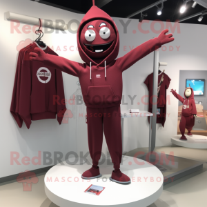 Maroon Trapeze Artist mascot costume character dressed with a Sweatshirt and Cufflinks