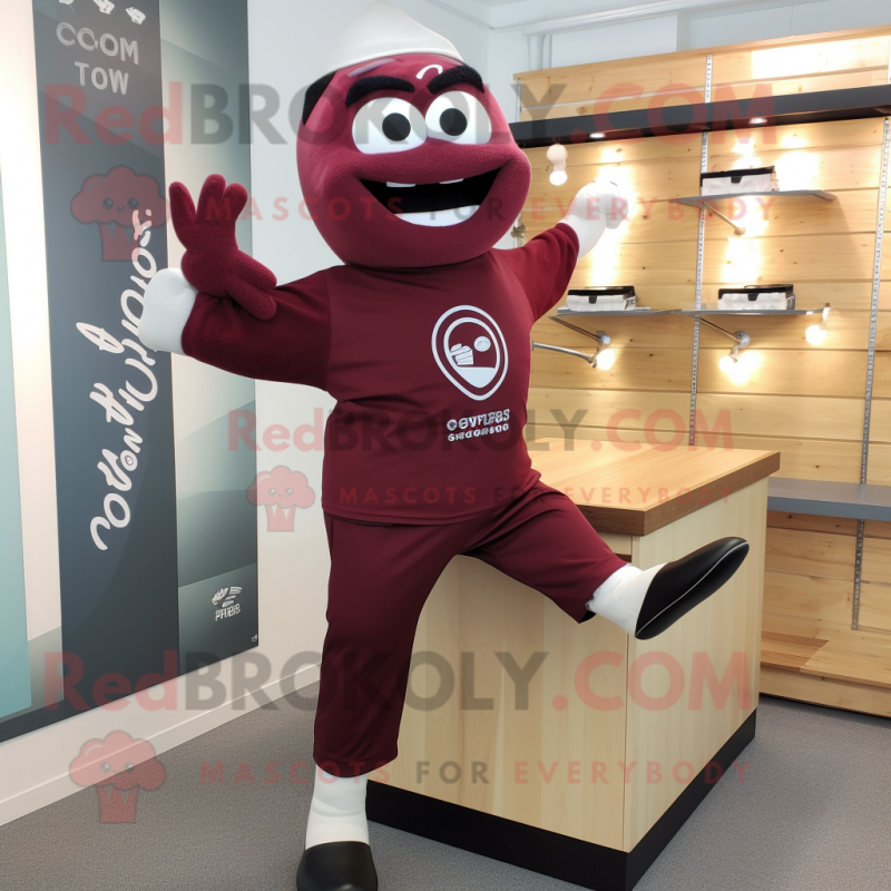 Maroon Trapeze Artist mascot costume character dressed with a Sweatshirt and Cufflinks Maroon Trapeze Artist mascot costume character dressed with a Sweatshirt and Cufflinks