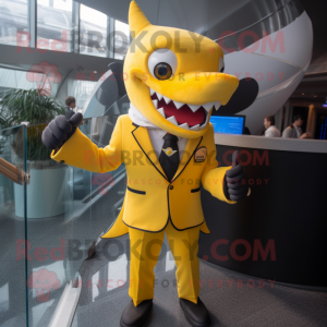 Yellow Shark mascot costume character dressed with a Suit and Cufflinks