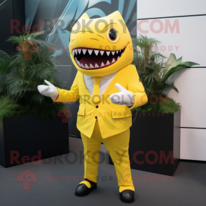 Yellow Shark mascot costume character dressed with a Suit and Cufflinks