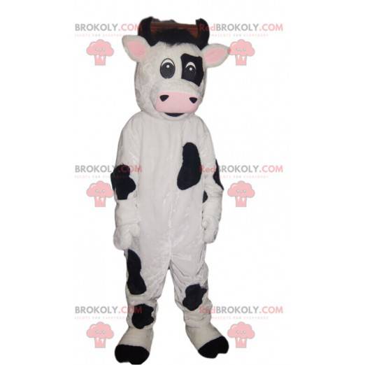 Mascotte della mucca in bianco e nero - Redbrokoly.com