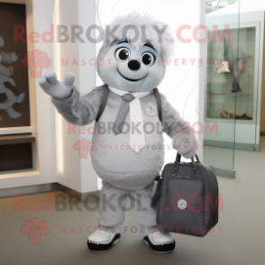 Silver Alliance mascot costume character dressed with a Suit Pants and Tote bags