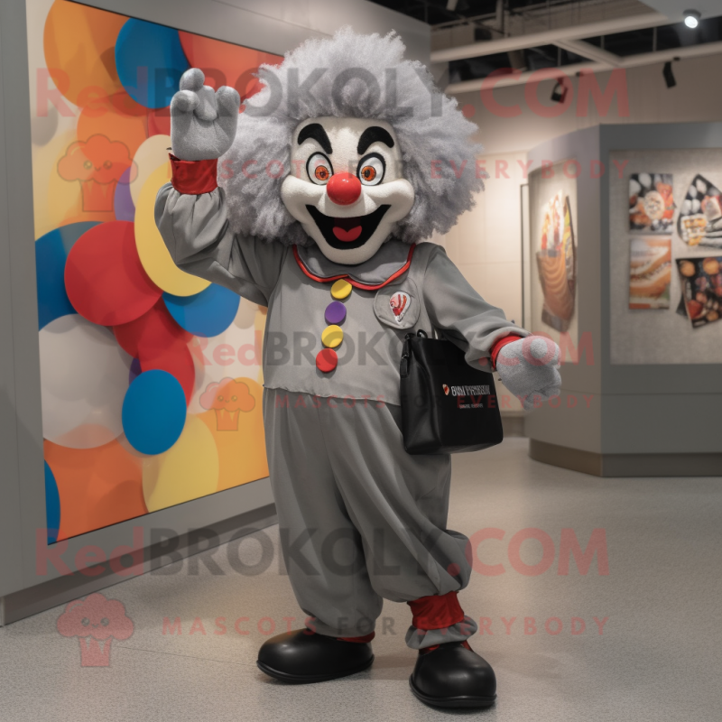 Gray Clown mascot costume character dressed with a Jumpsuit and Messenger bags