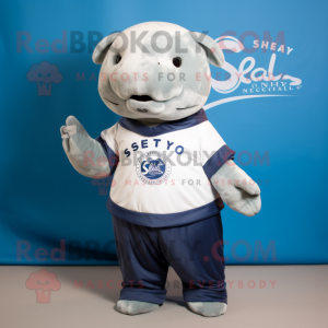 Navy Stellar'S Sea Cow mascot costume character dressed with a Henley Shirt and Rings