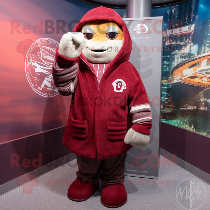 Maroon Baseball Glove mascot costume character dressed with a Hoodie and Scarves Maroon Baseball Glove mascot costume character dressed with a Hoodie and Scarves