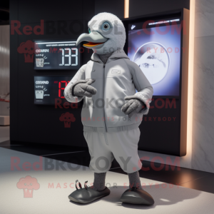 Gray Pigeon mascot costume character dressed with a Joggers and Digital watches