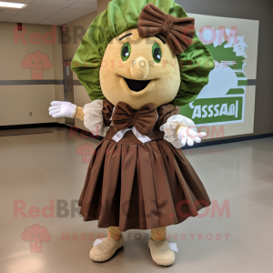 Brown Caesar Salad mascot costume character dressed with a Shift Dress and Bow ties
