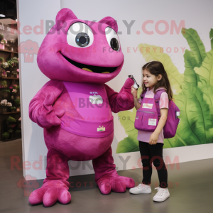 Magenta Frog mascot costume character dressed with a Corduroy Pants and Smartwatches