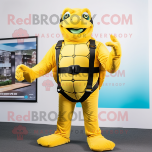 Yellow Turtle mascot costume character dressed with a Rash Guard and Suspenders