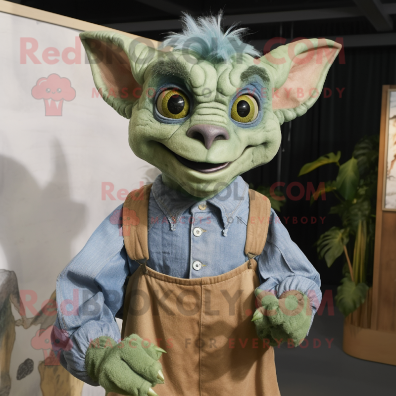 Green Gargoyle mascot costume character dressed with a Chambray Shirt and Earrings