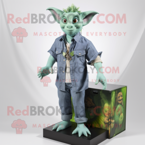Green Gargoyle mascot costume character dressed with a Chambray Shirt and Earrings