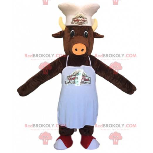 Mascota de jabalí marrón con gorro de cocinero y delantal