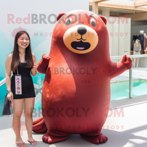 Maroon Sea Lion mascot costume character dressed with a One-Piece Swimsuit and Hairpins