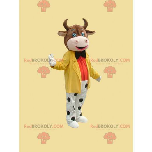 Mascotte mucca marrone vestita con un abito colorato -