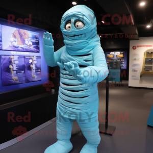 Cyan Mummy mascot costume character dressed with a Jacket and Suspenders