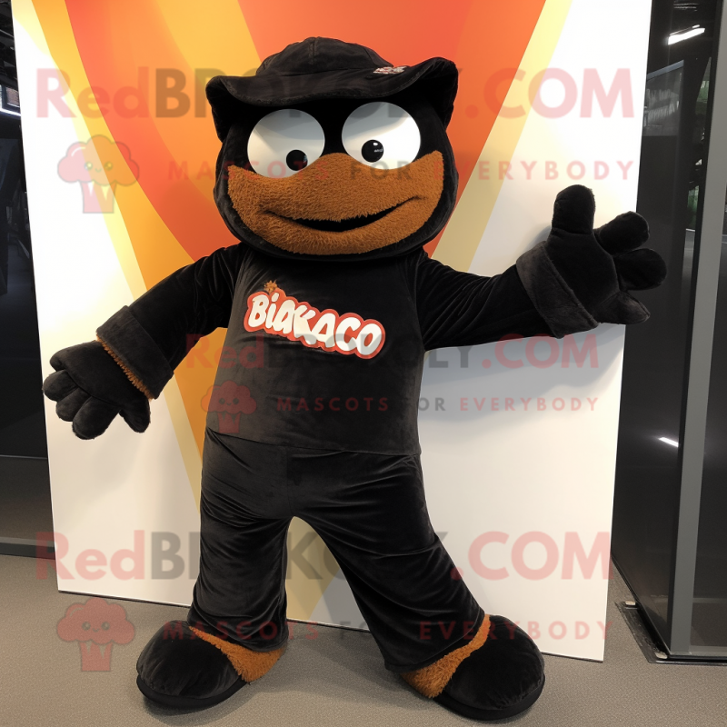 Black Tikka Masala mascot costume character dressed with a Corduroy Pants and Wraps