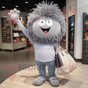 Gray Meatballs mascot costume character dressed with a Skinny Jeans and Tote bags