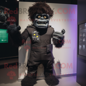 Black Frankenstein'S Monster mascot costume character dressed with a T-Shirt and Gloves