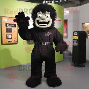 Black Frankenstein'S Monster mascot costume character dressed with a T-Shirt and Gloves