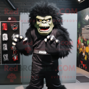 Black Frankenstein'S Monster mascot costume character dressed with a T-Shirt and Gloves