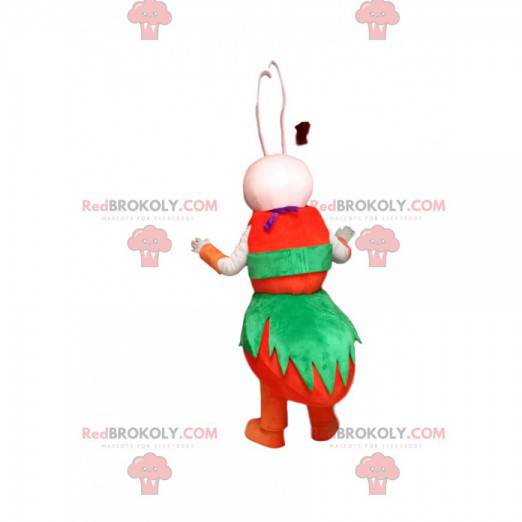 Mascote formiga branca com uma roupa vermelha e verde -