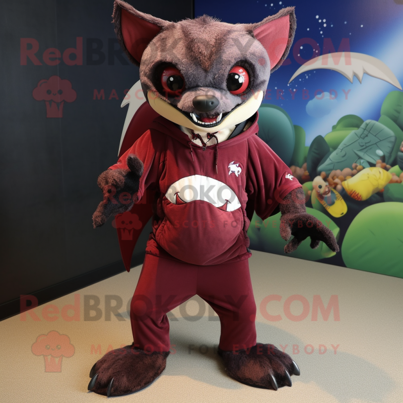 Maroon Fruit Bat mascot costume character dressed with a Rash Guard and Shoe laces