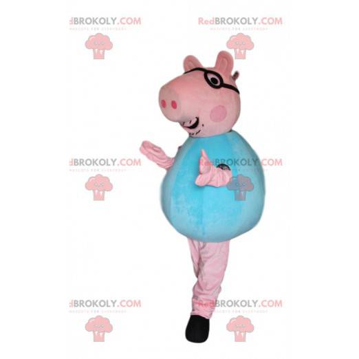 Rosa Schweinemaskottchen mit Brille und blauem Trikot -