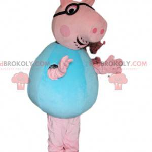 Mascote porco rosa com óculos e uma camisa azul - Redbrokoly.com