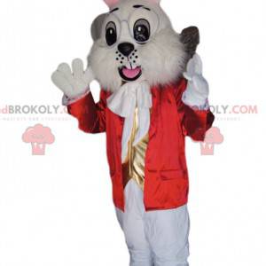 Hvid kaninmaskot med en rød jakke og en gylden vest -