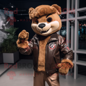 Brown Puma mascot costume character dressed with a Moto Jacket and Headbands