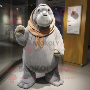 Gray Walrus mascot costume character dressed with a Long Sleeve Tee and Shawl pins