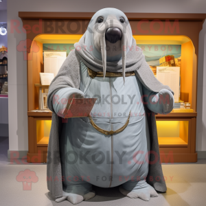 Gray Walrus mascot costume character dressed with a Long Sleeve Tee and Shawl pins