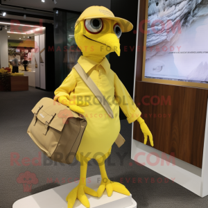 Lemon Yellow Archeopteryx mascot costume character dressed with a Henley Shirt and Clutch bags