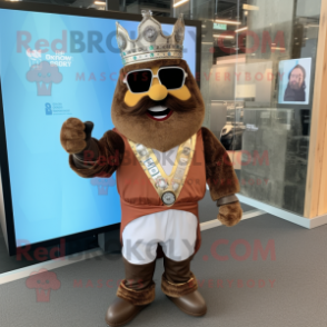 Brown King mascot costume character dressed with a Blazer and Digital watches