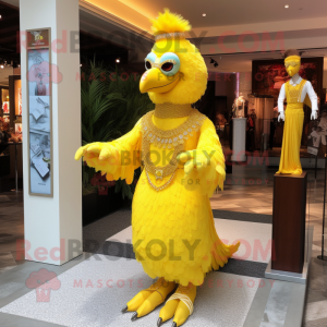 Yellow Fried Chicken mascot costume character dressed with a Empire Waist Dress and Bracelets