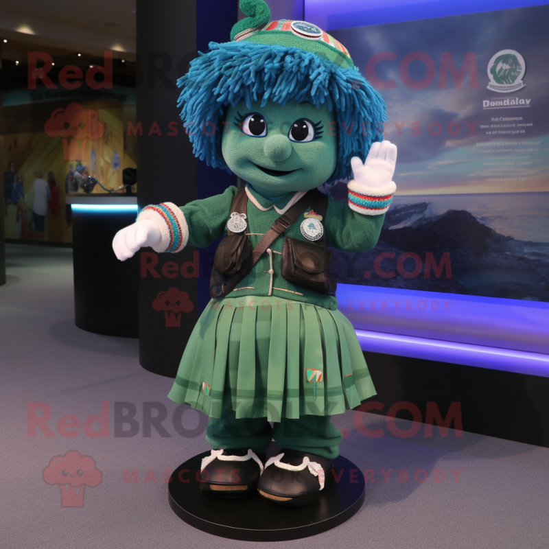 Blue Green Beret mascot costume character dressed with a Skirt and Bracelets Blue Green Beret mascot costume character dressed with a Skirt and Bracelets