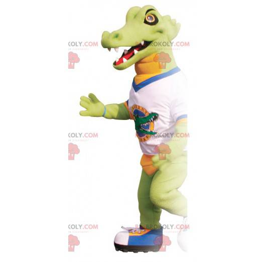 Green and orange crocodile mascot with a t-shirt -