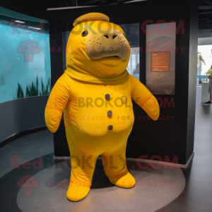 Yellow Stellar'S Sea Cow mascot costume character dressed with a Playsuit and Tie pins