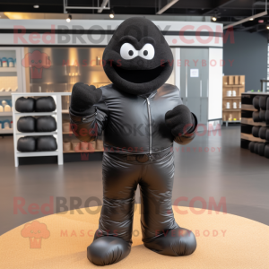 Black Boxing Glove mascot costume character dressed with a Leather Jacket and Pocket squares