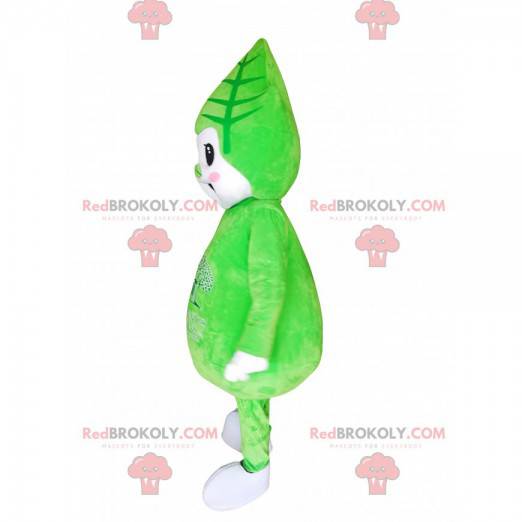 Grünes Charakter-Maskottchen mit einem Blatt auf seinem Kopf -
