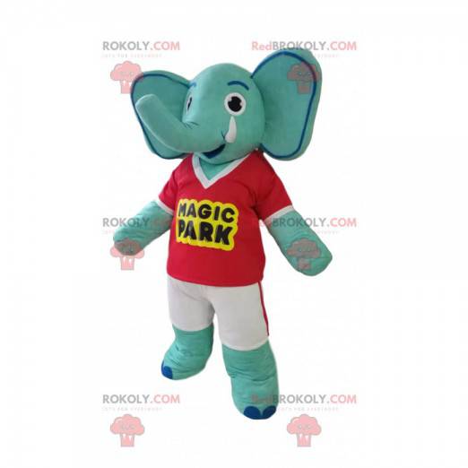 Mascota elefante azul con una camiseta roja y pantalones cortos