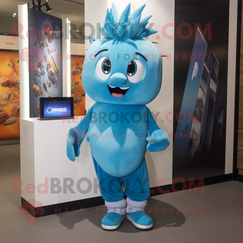 Cyan Aglet mascot costume character dressed with a Graphic Tee and Earrings